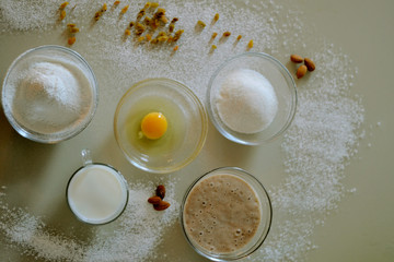 Ingredients for banana cupcakes with raisins and almonds 