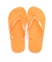 Stylish flip-flops on white background