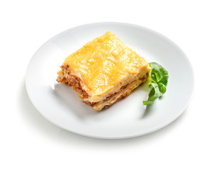 Plate with tasty baked lasagna on white background