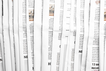 Many different newspapers, closeup view