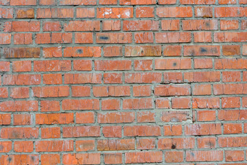 Old brick wall of red color, panorama of masonry. Texture background.
