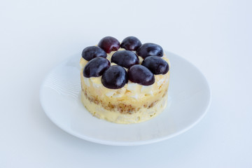 The legendary Tiffany layered salad with grapes, chicken and cheese on the white background.