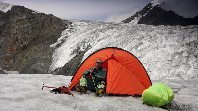 Stock video footage climber in the mountains, climber, mountaineer, alpinist