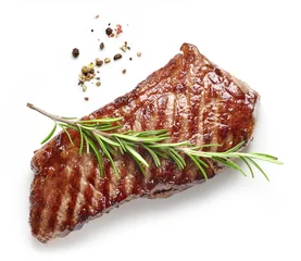 Foto op Plexiglas Grilled beef steak with rosemary and pepper isolated on white background top view © Karlis