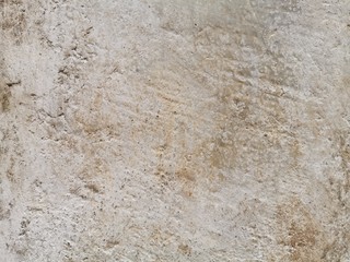 Texture of old gray concrete wall for background and wallpaper. Wall fragment with scratches and cracks