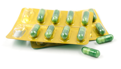 Pills in pack isolated on white background. close-up