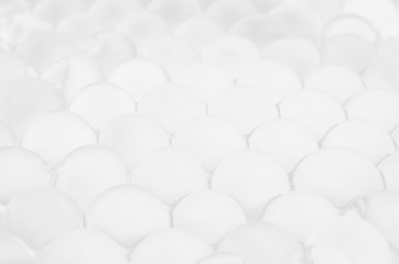 White soft light texture of heap transparent balls as elegant modern abstract background with...