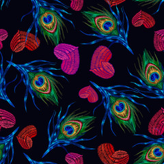 Fototapeta na wymiar Embroidery peacock feathers and red hearts seamless pattern. Symbol of love, passion. Classical fashionable art. Template design of clothes