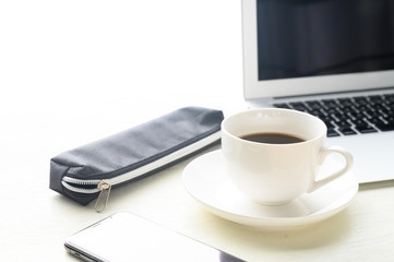 Fototapeta na wymiar caffee and caffee cup and laptop pc
