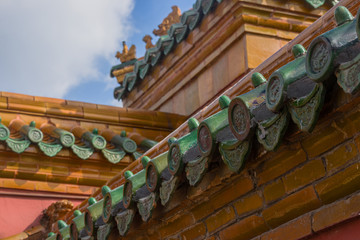 Blue sky and white clouds under the imperial palace ancient buildings cornices close-up