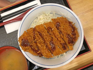 Tonkatsu set, a Japanese dish that consists of a breaded, deep-fried pork cutlet, eat with miso soup.