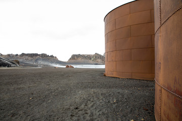 Abandoned Storage Tanks from a whaling station at Deception Island, Antarctica.