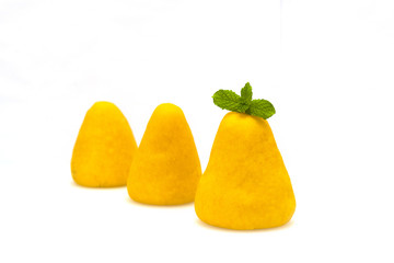 Wuwutou on a white background, dotted with a mint leaf.