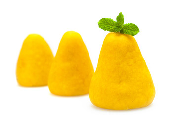 Wuwutou on a white background, dotted with a mint leaf.