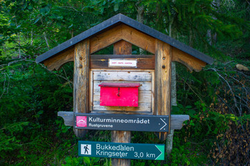 Beautiful house with a map of the area in forest of Norway