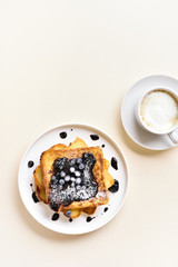 French toasts with blueberry sauce