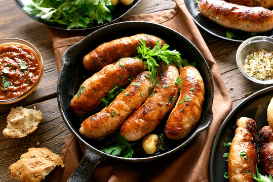 Fried sausages in frying pan