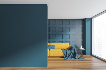 Dark blue living room with yellow sofa and mock up