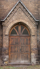 Fototapeta premium Old wooden doors of cathedral