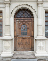 Vintage wooden door in old building