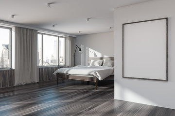 White master bedroom corner with poster