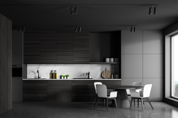 Gray and wood kitchen with counters and bar