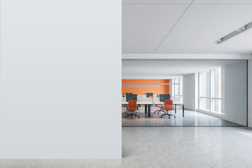 Mock up wall in bright orange open space office