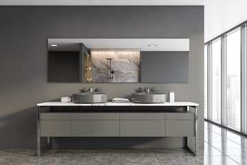 Panoramic grey bathroom with double sink