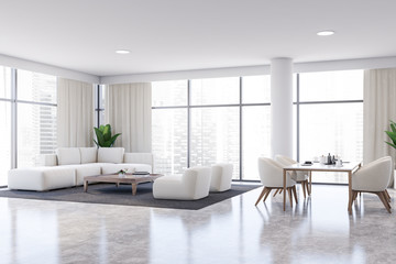 White living room and dining room corner