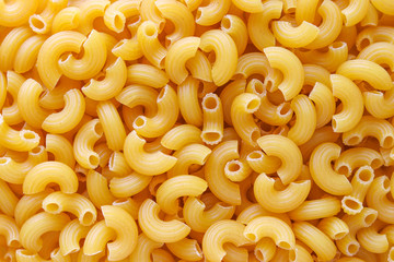 Macaroni spaghetti pattern background. Macaroni is a type of pasta.