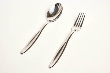 Kitchen knifes, spoons and forks. Cutlery