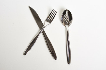 Kitchen knifes, spoons and forks. Cutlery
