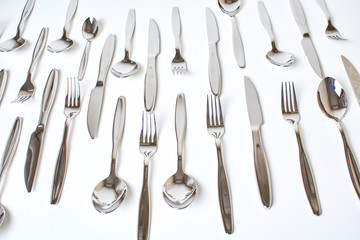 Kitchen knifes, spoons and forks. Cutlery