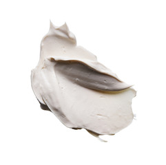 White smear and texture made by face clay or cream isolated on white background.