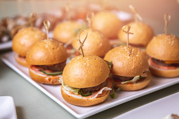 Restaurant food mini burger table with snack delicious dining. Catering service