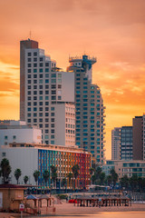Tel Aviv Skyline, Israel. Cityscape image of Tel Aviv beach with some of its famous hotels during sunrise and night