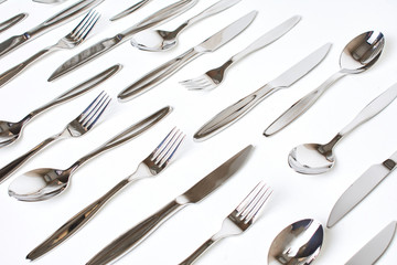 Set of forks on grey background. Forks as background