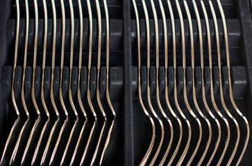 Set of forks on grey background. Forks as background