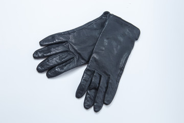  Black female leather gloves on a white background