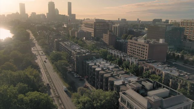 Aerial: flying over Charles River looking out to Boston University. Boston, Massachusetts, USA. 28 August 2019