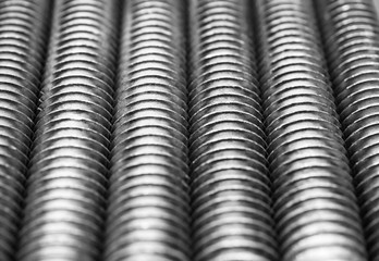 Bolts thread texture. Macro photo. Abstract background.