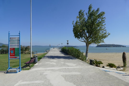 pier for ferries to Maggiore Island and Polvese Island in the lakeside of Tuoro on Trasimeno Lake.
