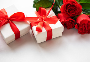 Red roses and gift boxes