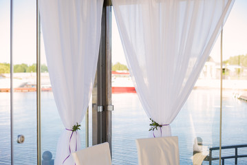 White chiffon curtains on the window