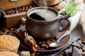 Black coffee on an old background in a cup