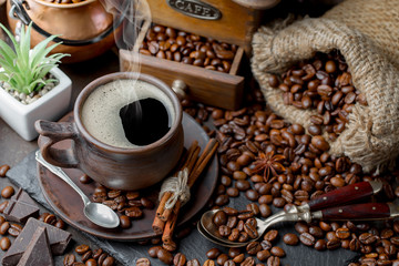 Black coffee on an old background in a cup