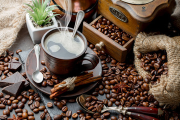 Black coffee on an old background in a cup