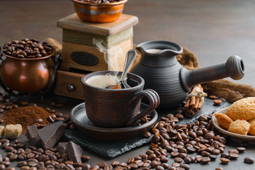 Black coffee on an old background in a cup