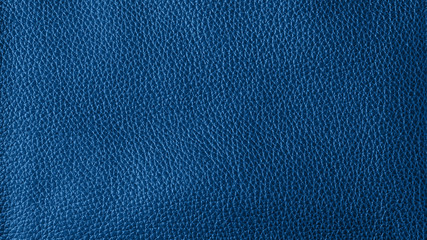 The leather sample is tinted in the trendy color 2020, classic blue. Abstract background in...