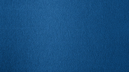 Pure cashmere is toned in the trendy color 2020, classic blue. Abstract background in fashionable color
